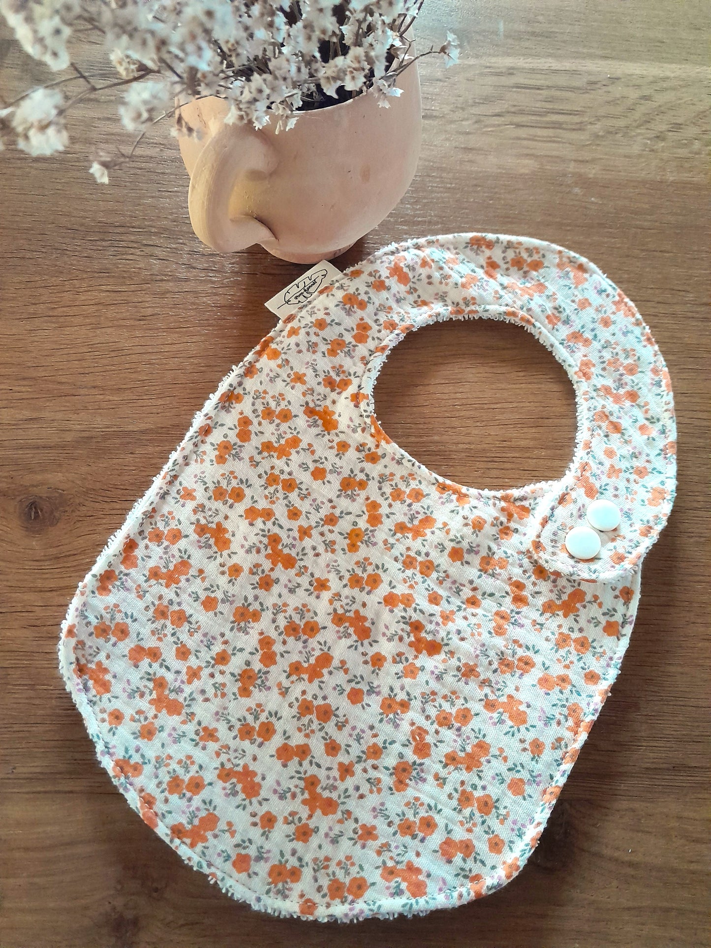 Ensemble cape de bain, anneau de dentition et bavoir