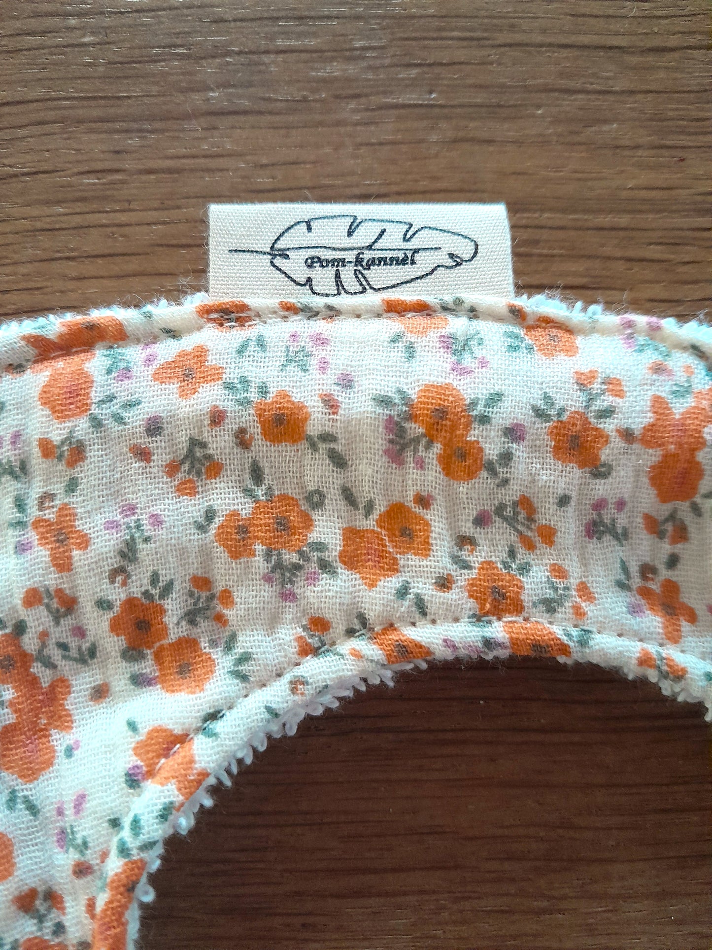 Ensemble cape de bain, anneau de dentition et bavoir